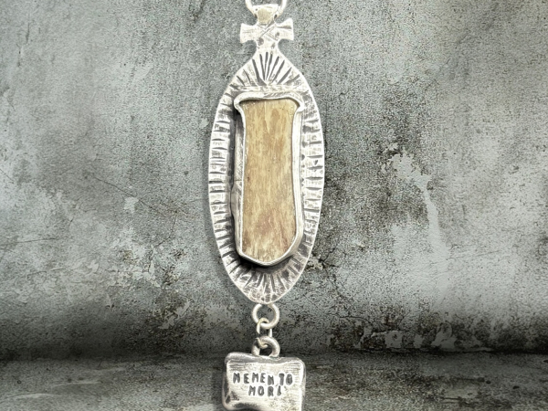 Memento Mori with human rib section